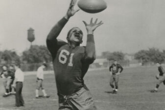 Willis Ward catching a football over his shoulder